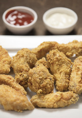 homemade crispy fried chicken on white