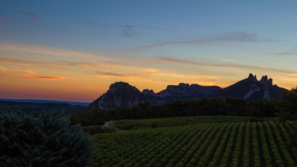 The Dentelles de Montmirail seen from the distance during sunset in Vaucluse, Provence, France