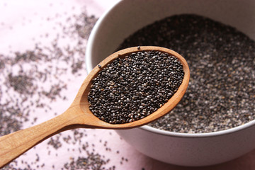 chia seeds on a wooden background. Useful supplements, super food, healthy food, veggie