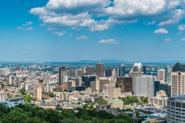 Obraz premium MONTREAL, QUEBEC / CANADA - JULY 15 2018: Montreal cityscape. View from the port..