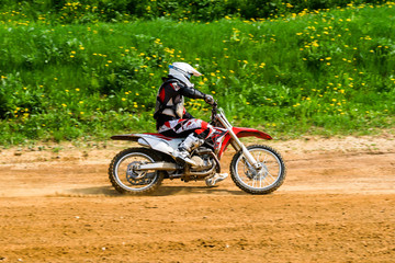 Fototapeta na wymiar Motocross rider in the action