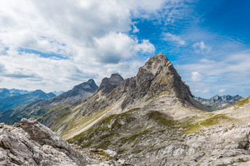 Fototapeta na wymiar Mountain view in Allgäu Alps with Biberkopf, Rappenseekopf and Hochgundspitze
