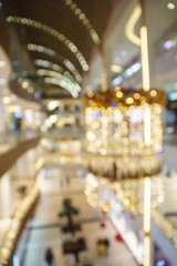 Fototapeta na wymiar Abstract blur shopping mall in department store interior for background. Defocused