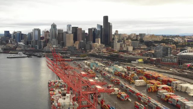 Aerial industrial port with view of Seattle Downtown 4k