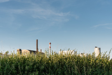 Industrial buildings behind the grass in Banska Bystrica, Slovakia