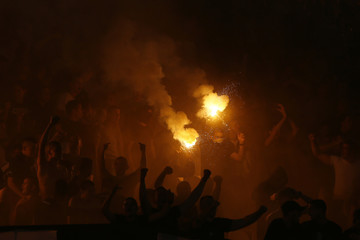  Football fans with torches during the eternal rivals have met in the Eternal soccer derby