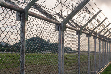 Fototapeta premium Background War Net Barrier Barbed Wire Conflict in Phuket Thailand