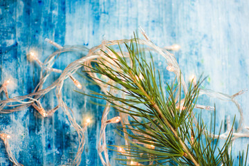 Christmas lights on wooden background
