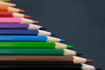 color pencil on black background