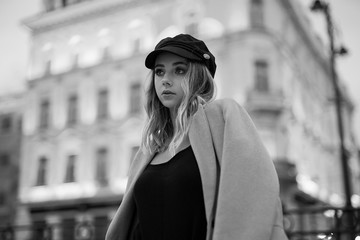 Fashion portrait of Positive fashion shine beautyful girl enjoy life. Portrait of beautiful caucasian woman with beautiful face walking outdoors. Copy space.