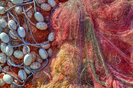 Pile of fishing nets closeup