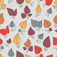 Seamless pattern of hand-drawn and colored leaves.Vector graphics . 