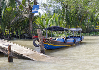 Boat in small harbor at Mekong river in My Tho, Vietnam