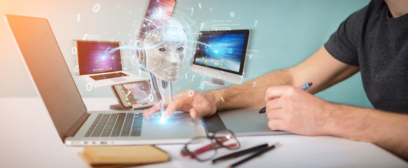 Graphic designer using white humanoid controlling modern devices 3D rendering