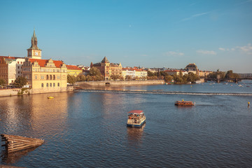 View to Vitava river from Charles Bridge in Prague, beautiful summer day