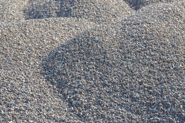Breakstone background. Road gravel. Gravel texture. Crushed Gravel background. Piles of limestone rocks. Break stones on construction site.