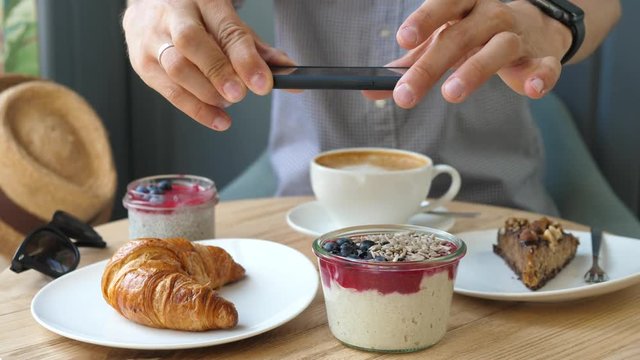 Man Hands Taking Photos Of Breakfast Food With Smartphone.