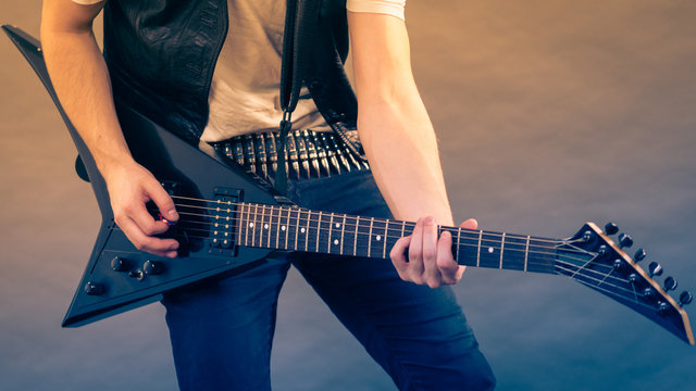 Man playing on electric guitar