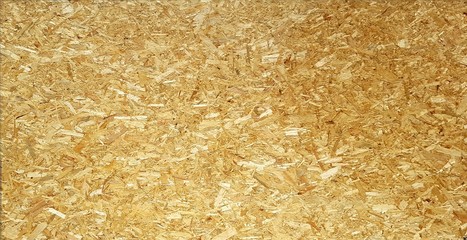 Chipboard. Large wood particle board used as a bulletin board