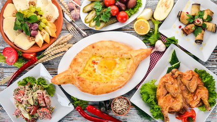 A set of food. Georgian cuisine. On a white wooden background. Free space for text. Top view.