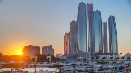 Foto op Canvas Al Bateen marina Abu Dhabi timelapse with modern skyscrapers on background © neiezhmakov