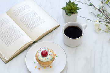 cupcakes coffee and reading while taking time to relax