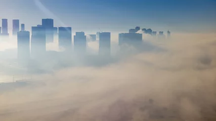 Foto op Canvas Skylines under the thick fog at the street timelapse of Abu Dhabi at morning © neiezhmakov