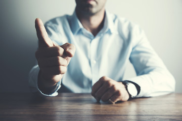 man pointing the finger to the observer