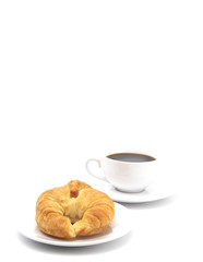 Freshly Baked Buttery French Croissants on a White Background with a Cup of Black Coffee