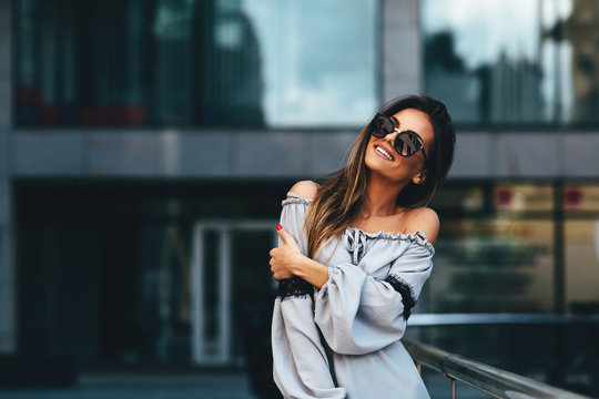 Portrait of a beautiful young woman in the city