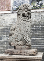 Chinese lion at the entrance of a temple