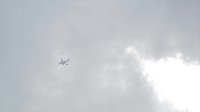 Plane Flying Through Dense Clouds