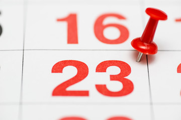 Pin on the date number 23. The twenty third day of the month is marked with a red thumbtack. Pin on...