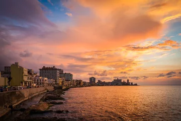 Zelfklevend Fotobehang Sunset at Malecon, the famous Havana promenades where  Habaneros, lovers and fishermen meet, Havana, Cuba © Maurizio De Mattei