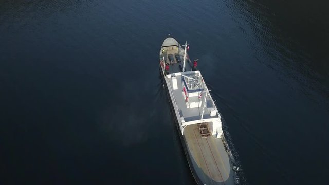 Overhead Drone View of a Ferry Arriving at a Dock on a Fjord in Norway