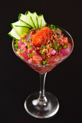 Ceviche cup on dark background