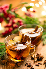 Mulled cider with cinnamon, cloves and anise. Traditional Christmas drink