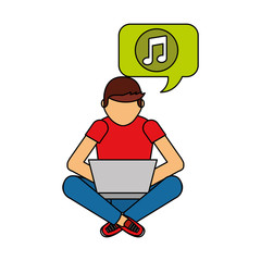 man sitting with laptop listening music