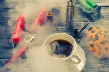 Still life with e-ciggarete and coffe on the wooden background