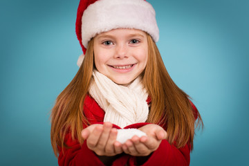 Happy Little Christmas Girl Holding Snow