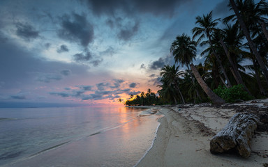 Sunset over a tropical island in the Caribbean