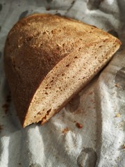 Fresh baked bread at  table.  Home made.