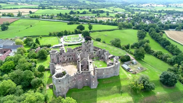 Aerial footage slowly moving away from Raglan Castle