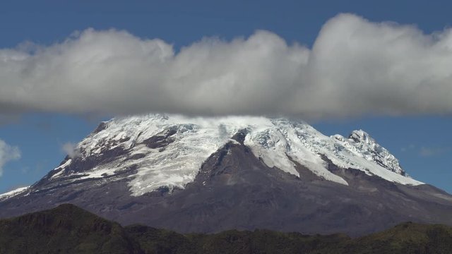 Time-lapse of clouds passing over the snowcapped Antisana Volcano, the fourth highest peak in Ecuador at 5,704 metres. The glaciers are retreating significantly due to climate change.