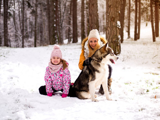Fototapeta na wymiar Happy family mother and child on winter