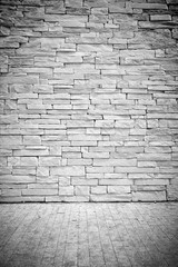 Vignette Light loft wall of stone blocks with floor