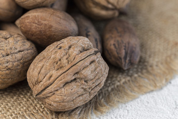 Assortment of nuts. On a light background.
