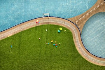 Close up outdoor swimming pool and toys with clear clean water