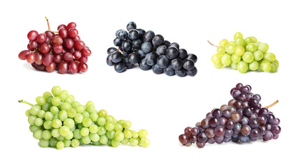 Set with different ripe grapes on white background
