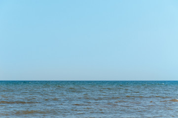 Background sea, ocean, surf waves on the beach